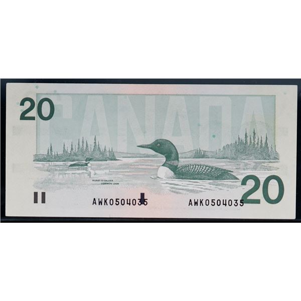 Error; 1991 $20 BC-58c #AWK0504035 AU-UNC.  Serial numbers shifted to the right touching the bar cod