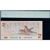 Image 2 : 1986 $2 BC-55b "cross over signature".  Lot of 4 notes CCGS Choice Uncirculated-64 to Gem Uncirculat
