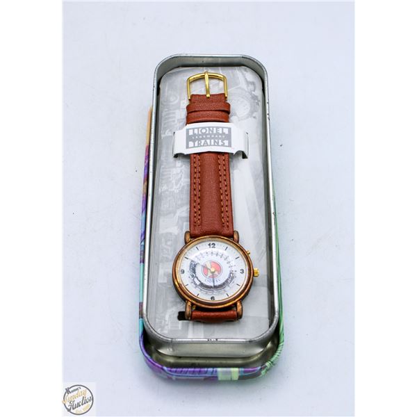 LIONEL TRAIN WRIST WATCH WITH TIN