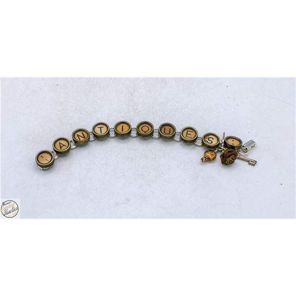 TYPEWRITER KEY BRACELET W ANTIQUES SCRIPT