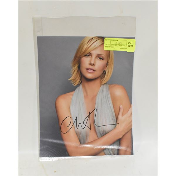 AUTOGRAPHED CHARLIZE THERON 8X10 W COA