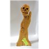 Image 1 : SIGNED WOOD CARVED SKULL & HAND STATUE