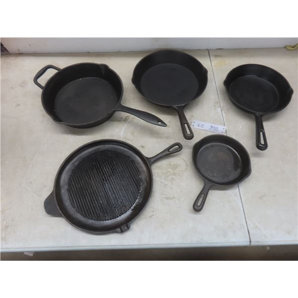 Five Cast Iron Frying Pans