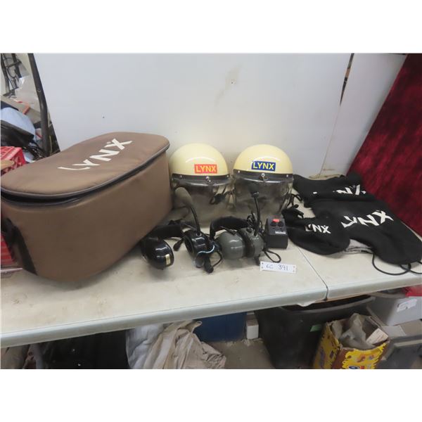 Two Lynx Flight Helmets with Headphones, Communications, and Storage Bag