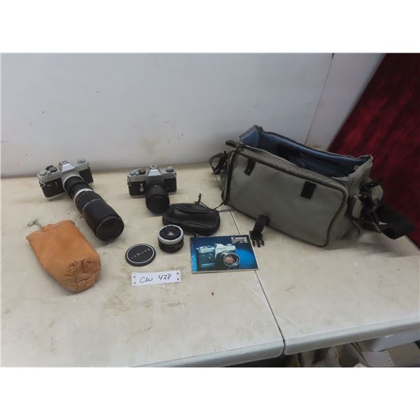 2 Canon Camera with Lenses and Carry Bag