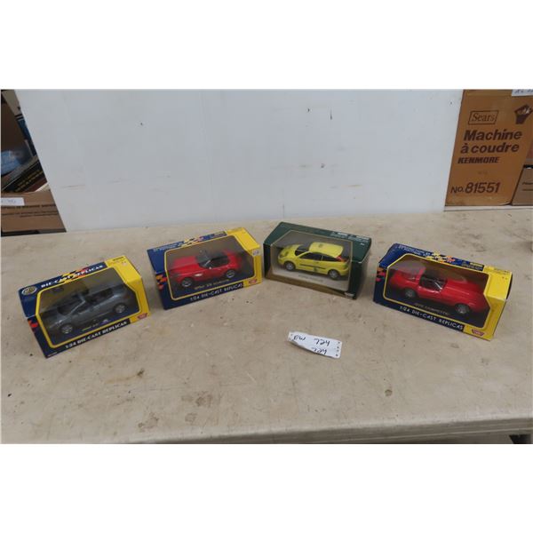 4 Diecast 1/24 Scale in Packages: 307cc, BMW Z8 Roadster, Ford 