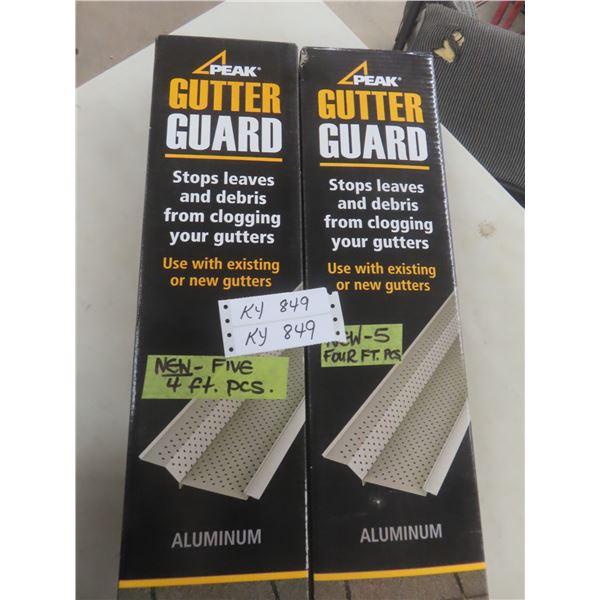Two New Boxes of Peak Gutter Guard, Five 4 Ft Pieces per Box