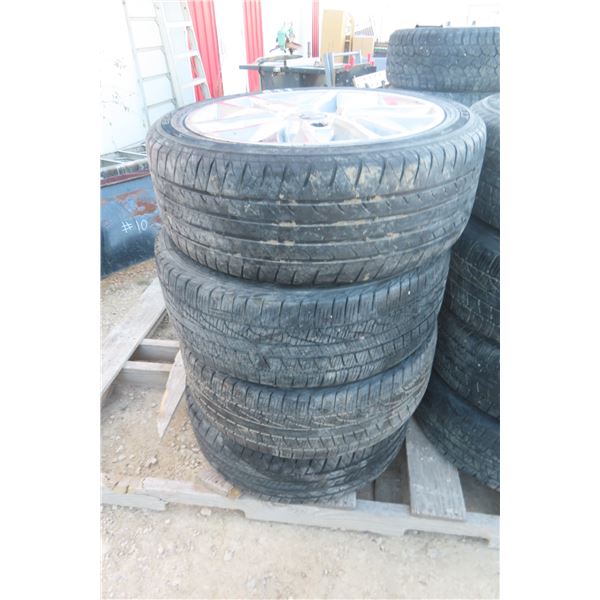 Set of 4 Ford Rims and Tires, 235/45R19 — Some Side Cracking Noted