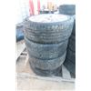 Set of 4 Ford Rims and Tires, 235/45R19 — Some Side Cracking Noted