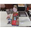 Knitting Needles; Porcelain Doll; Two DVDs; and Two Talking Head Knockers.