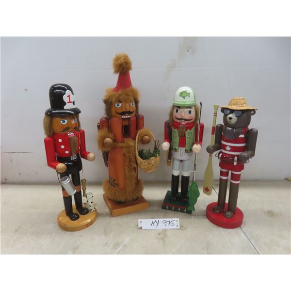 Four Vintage Nutcrackers—Fireman, Fisherman, Paddler, and Wood Gatherer; Tallest Approx. 16".