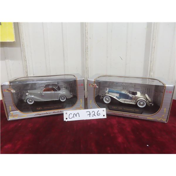 Two 1:32-Scale Die-Cast Cars