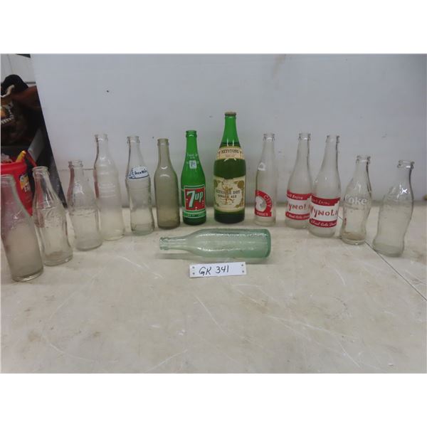 Fourteen Vintage Bottles (7-Up, Coke, Plains City, Wynol, Snow White, Keystone Ginger Ale) with Pro