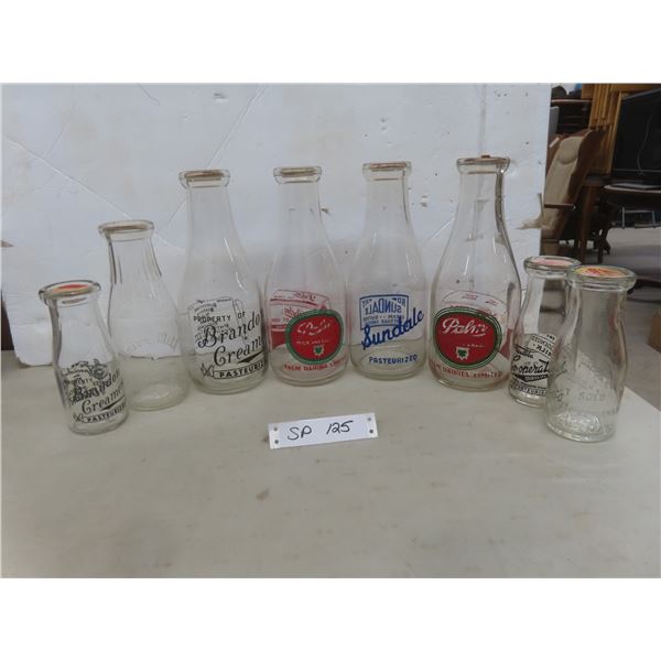 Eight Vintage Milk Bottles (Piggly Wiggly Brandon MB and Others)