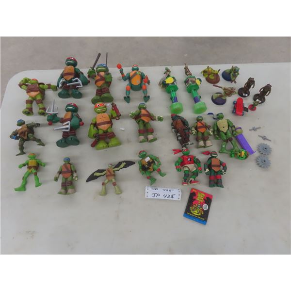 Over 25 TMNT Figures (Various Sizes), Pez Dispensers, Weapons, and Collector Cards