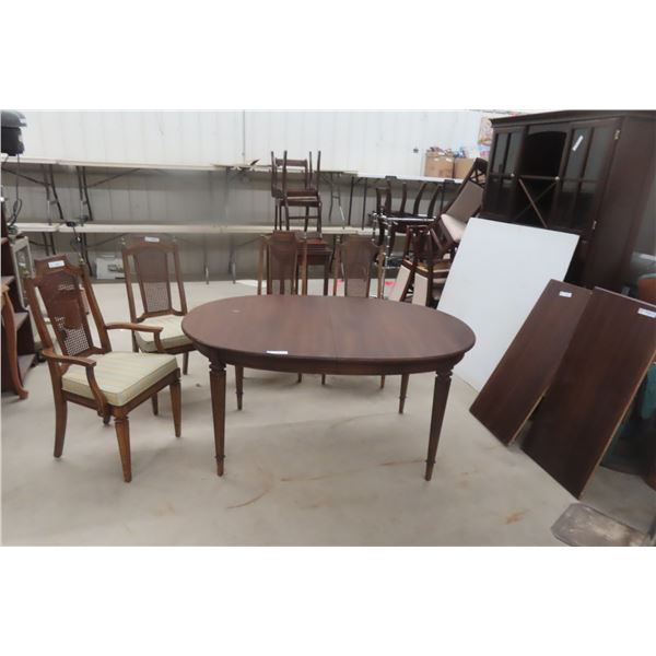 Dining Room Table, 29' × 40" × 60" With Two 18" Leaves and Four Chairs