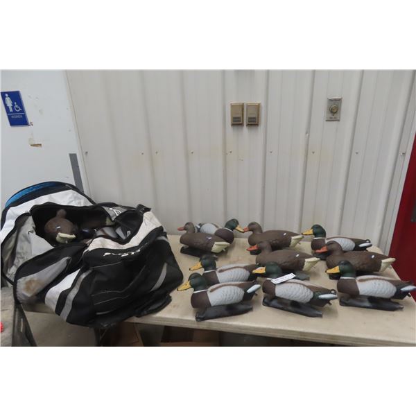 Twenty-Three Floating Duck Decoys (Hens and Drakes) and HJC Snowmobile Helmet (XXXL)