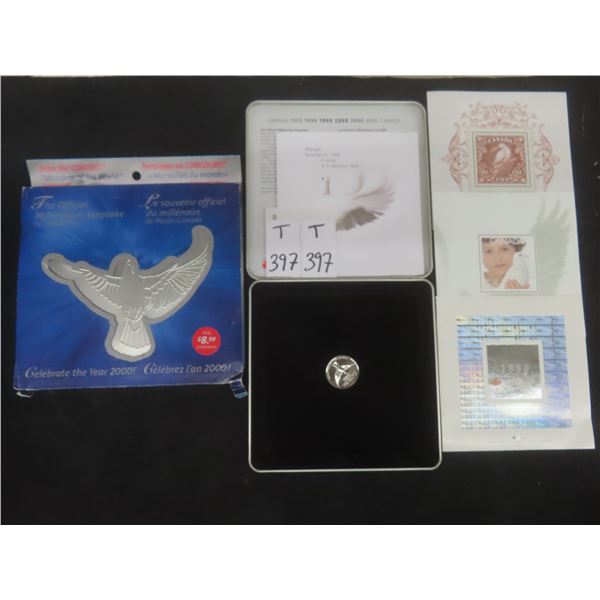 Two 2000 Canadian Millennium Keepsake Coin and Stamp Sets.