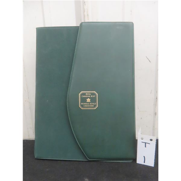 12 Canadian Uncirculated Coin Sets in Book, 1990–1999