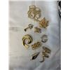 Image 1 : LARGE COLLECTION OF GOLD COLOURED BROOCHES SOME MARKED