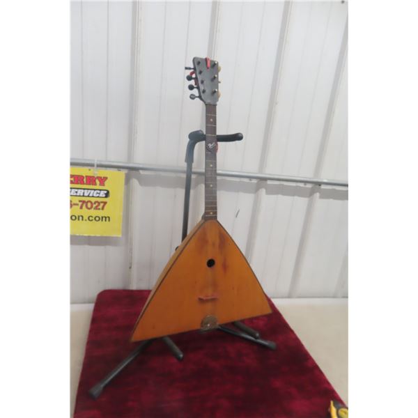 Mandolin Seems Very Old with Stand