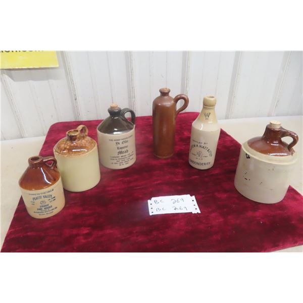 Six Stone Ware Small Jugs and Ginger Beer Bottles