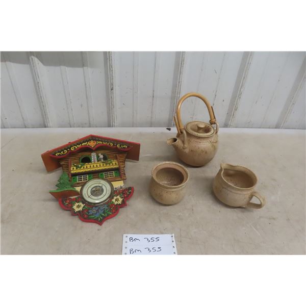 Beige Pottery Tea Service and German Black Forest Weather House