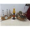 Image 1 : Ship Clock, Flower Arrangement, and Oil Lamp