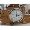 Image 3 : Ship Clock, Flower Arrangement, and Oil Lamp