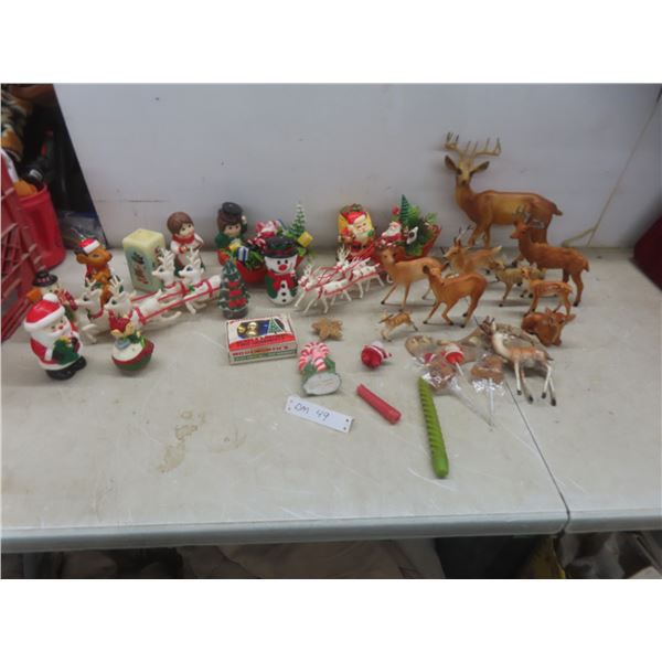Vintage Christmas Décor Lot Including Santa and Reindeer Figures, Deer Family, and Unused Christmas