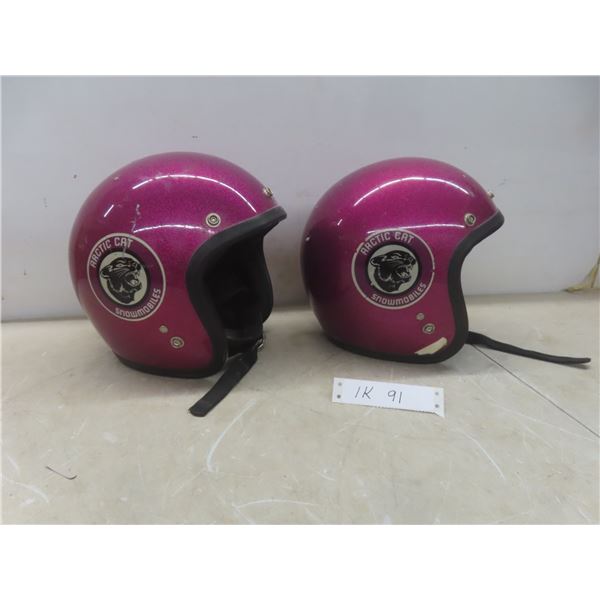 Two Arctic Cat Snowmobile Helmets