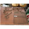 Image 1 : Five Cast-Iron Hooks and Cast Grate (19" × 17")