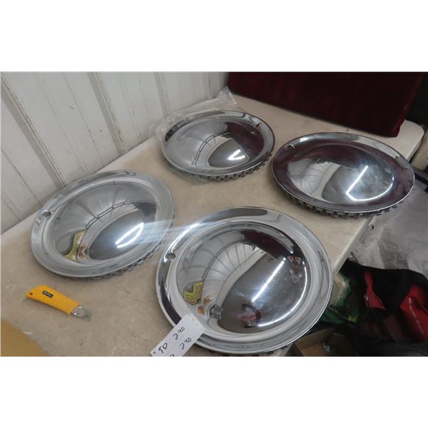 Four 15" Chrome Moon Hubcaps