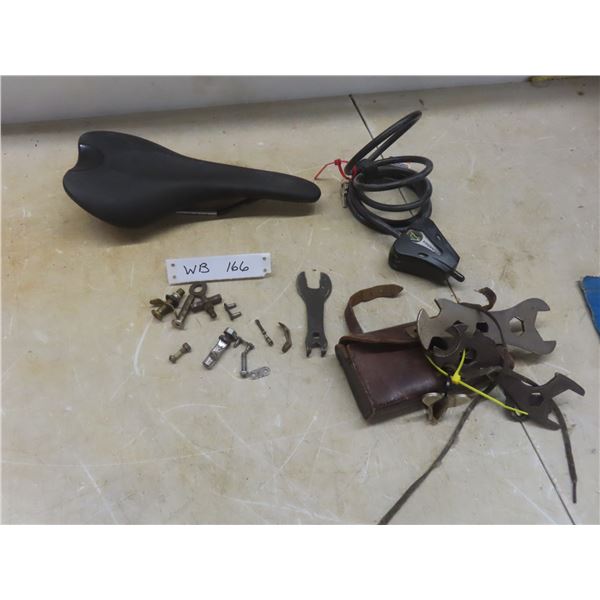 Vintage Bicycle Leather Tool Bag with Wrenches, Parts, Wheel Lock, and New Seat