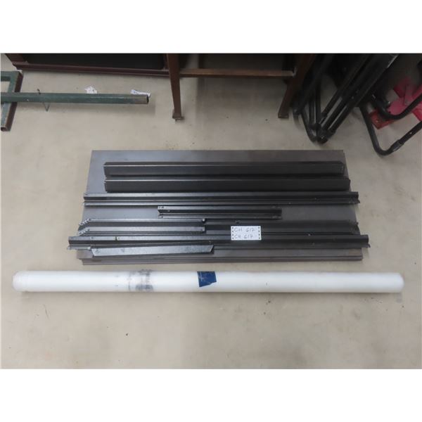 Roll of Vapour Barrier and Disassembled Shelving Unit