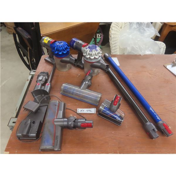 Two Dyson Chargeable Vacuums (Models V8 and V7) With One Charger