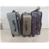 Image 7 : Three Rolling Suitcases