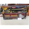 Image 1 : Two Diecast Tractor Trailers, 1/32 Scale (Peterbilt and Freightliner) in Original Packaging