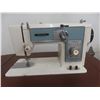 Image 2 : Universal Sewing Machine with Cabinet