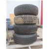 Image 6 : Four Ford Rims with Goodyear 235/75R15 Tires