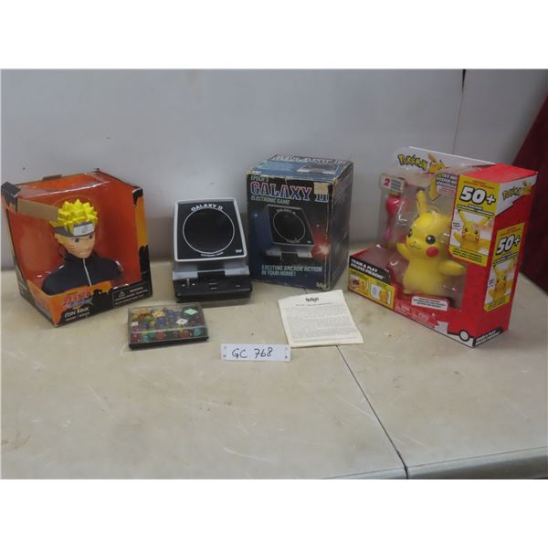 Epochs Galaxy II Electronic Game; Pokémon and Naruto Coin Bank; Dice and Marbles