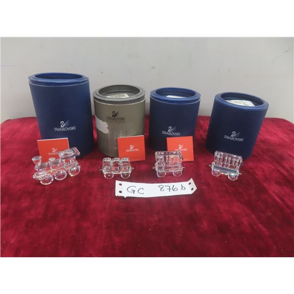 Four Swarovski Crystal Locomotion