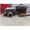 Image 2 : Vintage Cameras with Tripod, Red Duffle Bag & More (Missing Shoulder Strap)