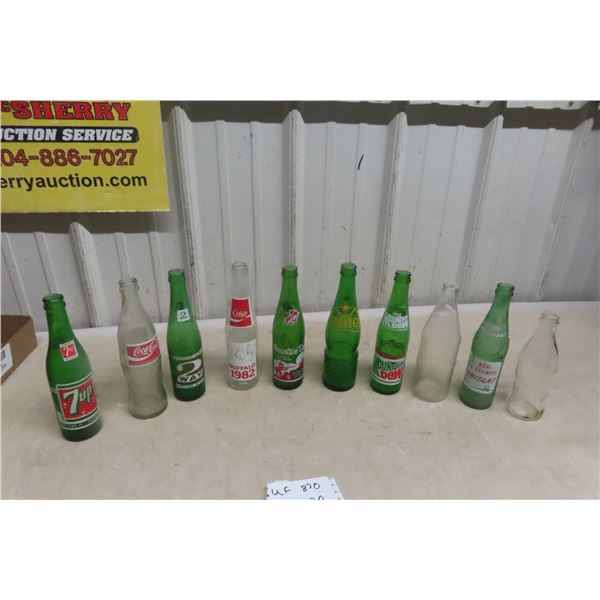 Ten Vintage Pop Bottles: 7UP, Mountain Dew, Coke, and Pepsi