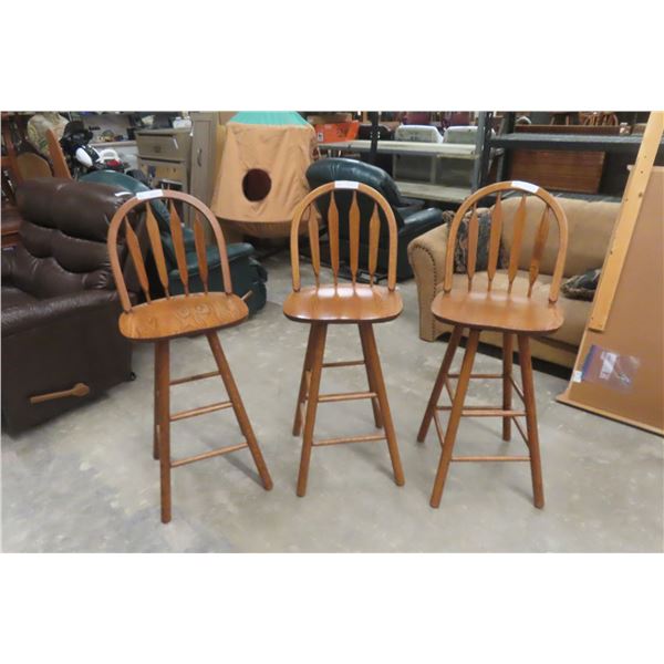 Three Oak Swivel Bar Stools