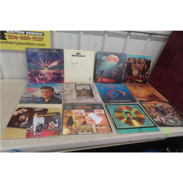 Twelve Vintage Rock ‘N’ Roll Vinyl LPs Including Beatles, AC/DC, CCR, Elton John and More