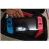 Image 5 : Nintendo Switch Console With Five Games, Accessories, Charger and Case (Tested Working)