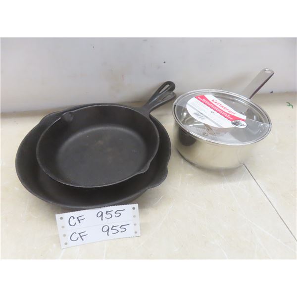 Two Cast Iron Frying Pans and New Stainless Steel Pot