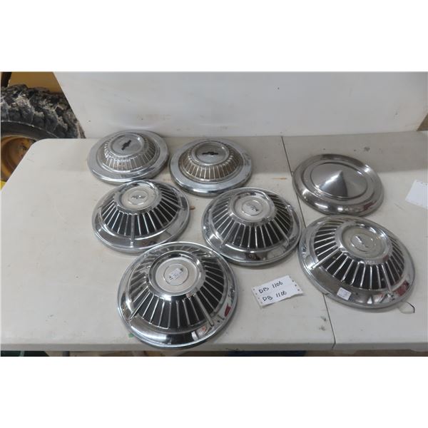 Seven Vintage Hubcaps (Chev)