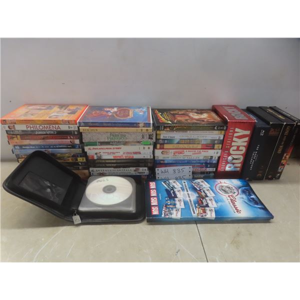 Over Fifty Classic Movie DVDs Including Godfather, Gone With the Wind, Rocky